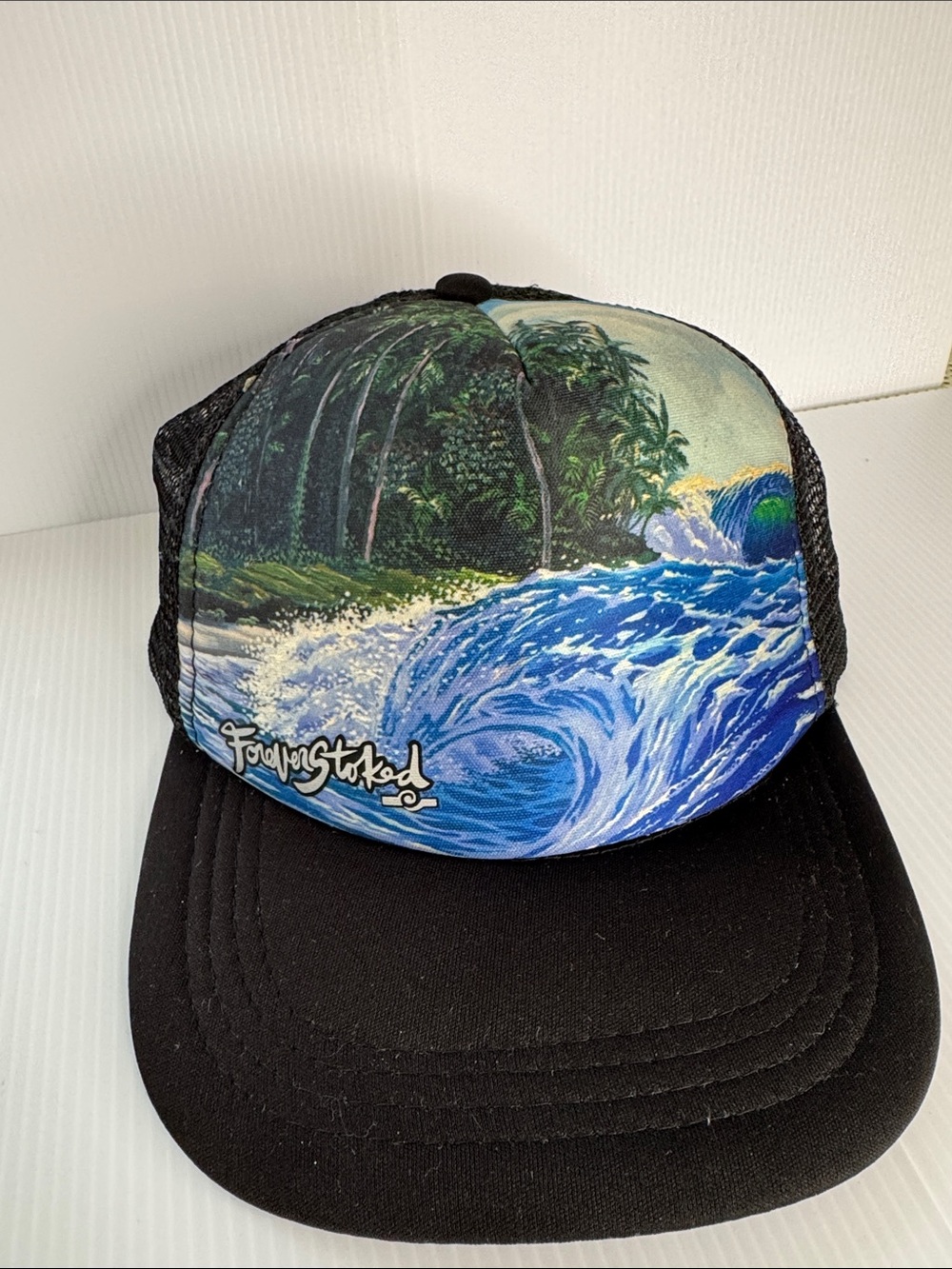 Black Trucker Hat with Ocean Wave Graphic
